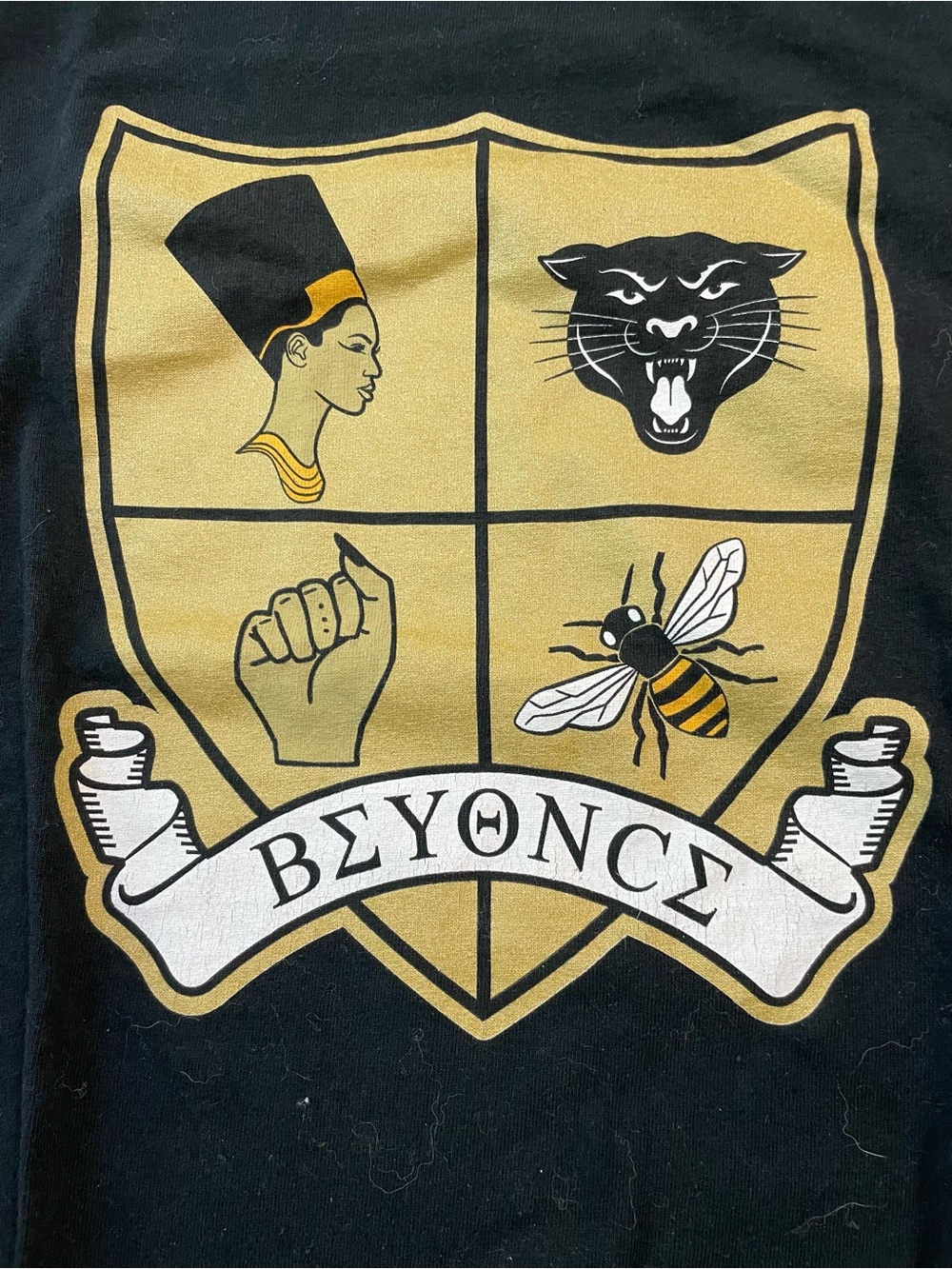 Beyonce Black Short Sleeve Graphic Tee with Gold Crest Design